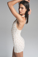 SKIMS Logo Pointelle Halter Onesie | Dress In Beauty SKIMS Logo Pointelle Halter Onesie | Dress In Beauty